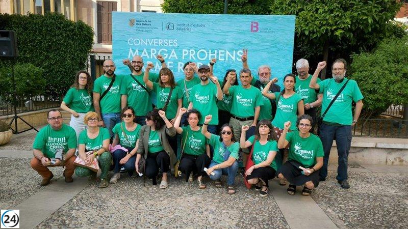 Activistas con camisetas verdes interrumpen evento de Prohens y Carme Riera.