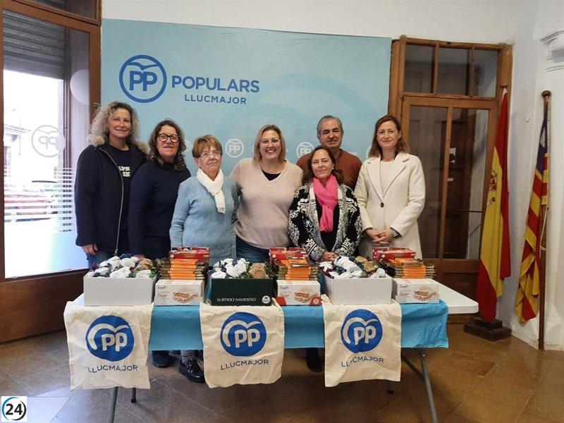 PP de Llucmajor dona alimentos y dulces navideños a Cáritas